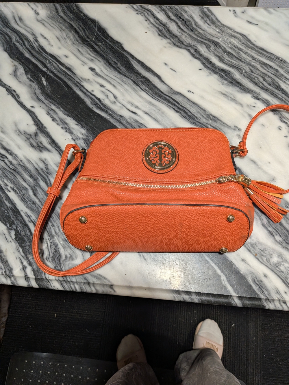 Bright Orange Pebbled Crossbody with Tassel and Medallion